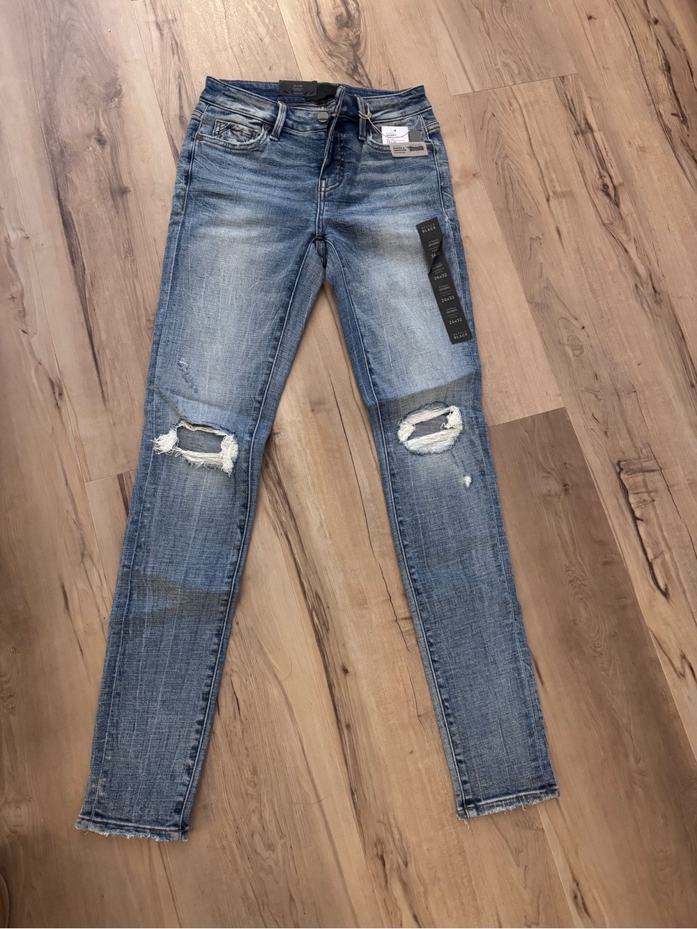 Buckle Distressed Skinny Jeans